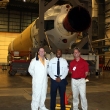 Jim Cotter, Chief Master Sergeant Jeff Hall, Dr John Slater in front DELTA rocket assembly @ Cape Canaveral Air Force Station